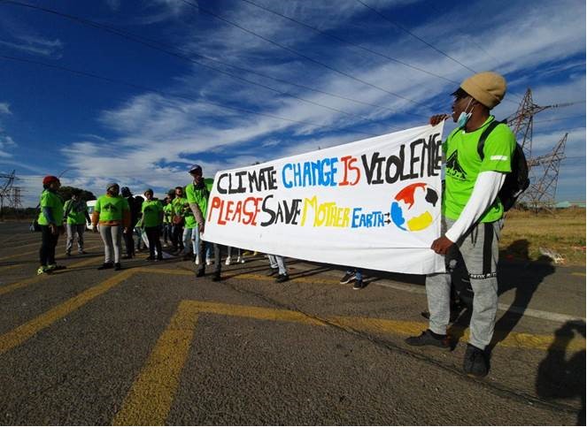 Community activists protest outside ArcelorMittal